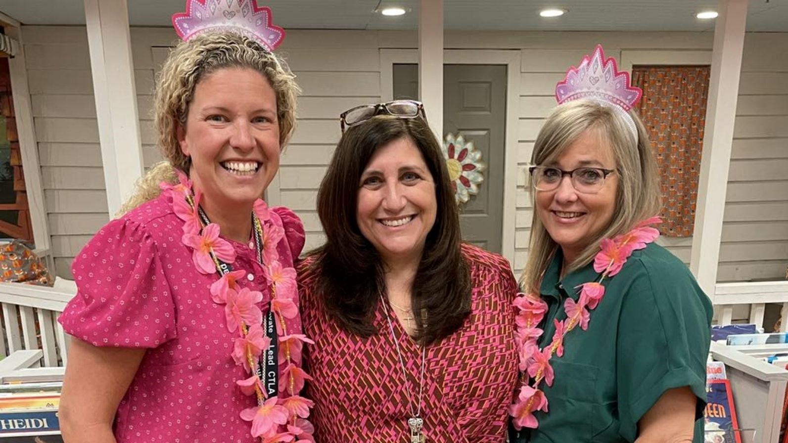 Erin Gray, Principal Donna Long, and Sandy Ahern celebrate